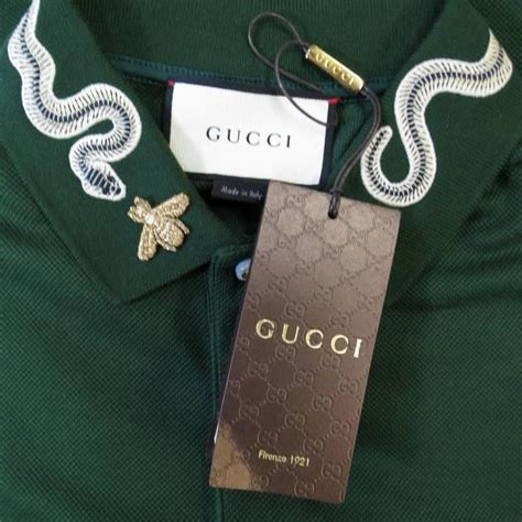 gucci pants snake green|Gucci shirt snake collar.